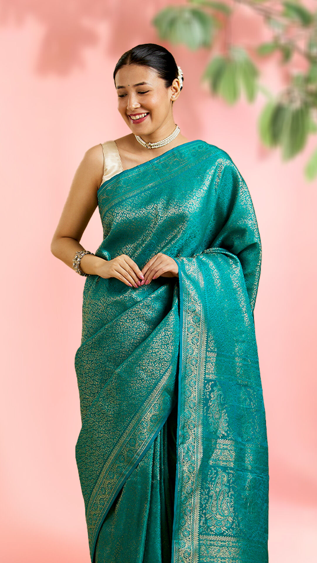 Sophisticated woman in a stunning blue silk saree, perfect for special occasions and celebrations